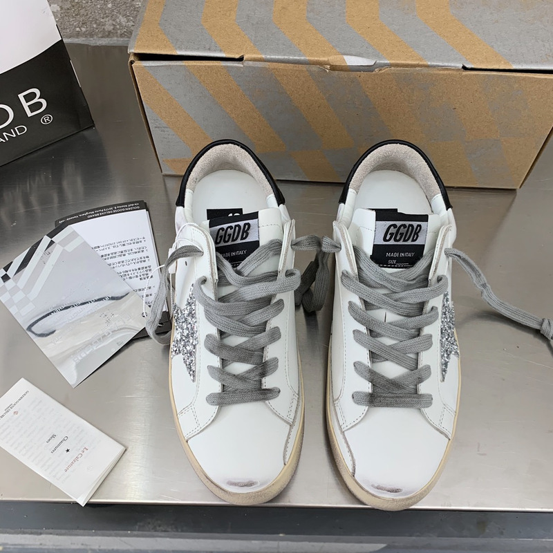 golden goose S*per-star sneakers with sliver glitter and black heel tab