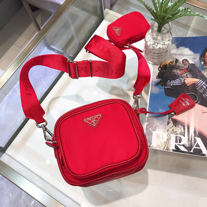 Pra*a saffiano leather mini pouch fiery red