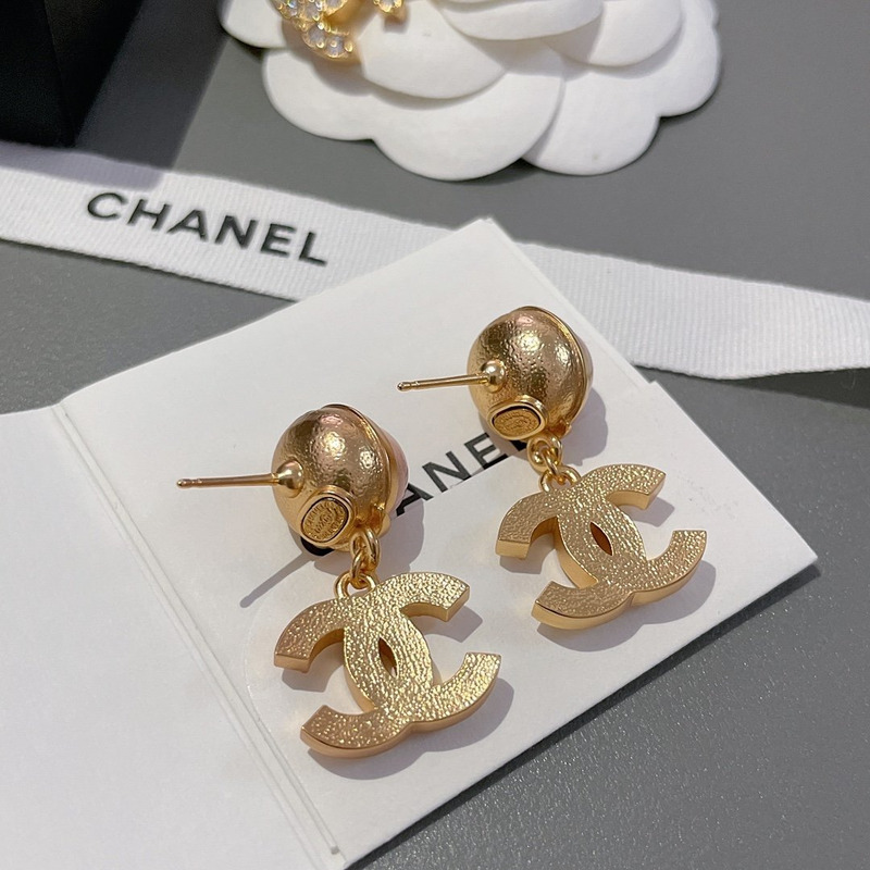 Ch*el earrings pink