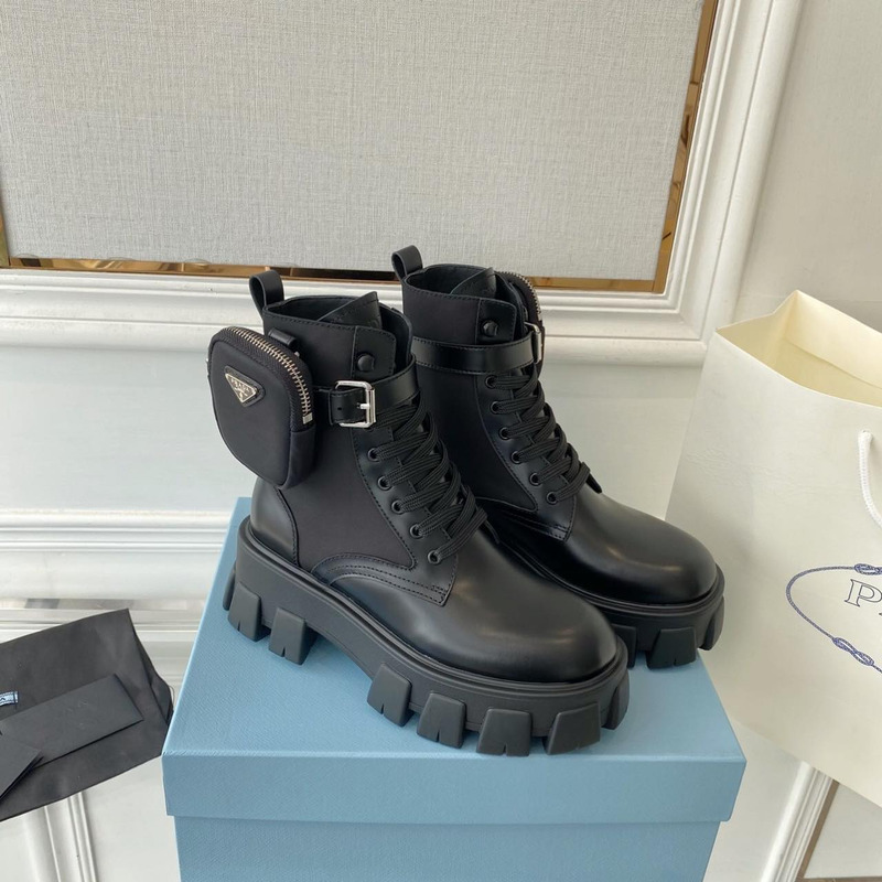 Pra*a monolith glossed leather and nylon short boots black