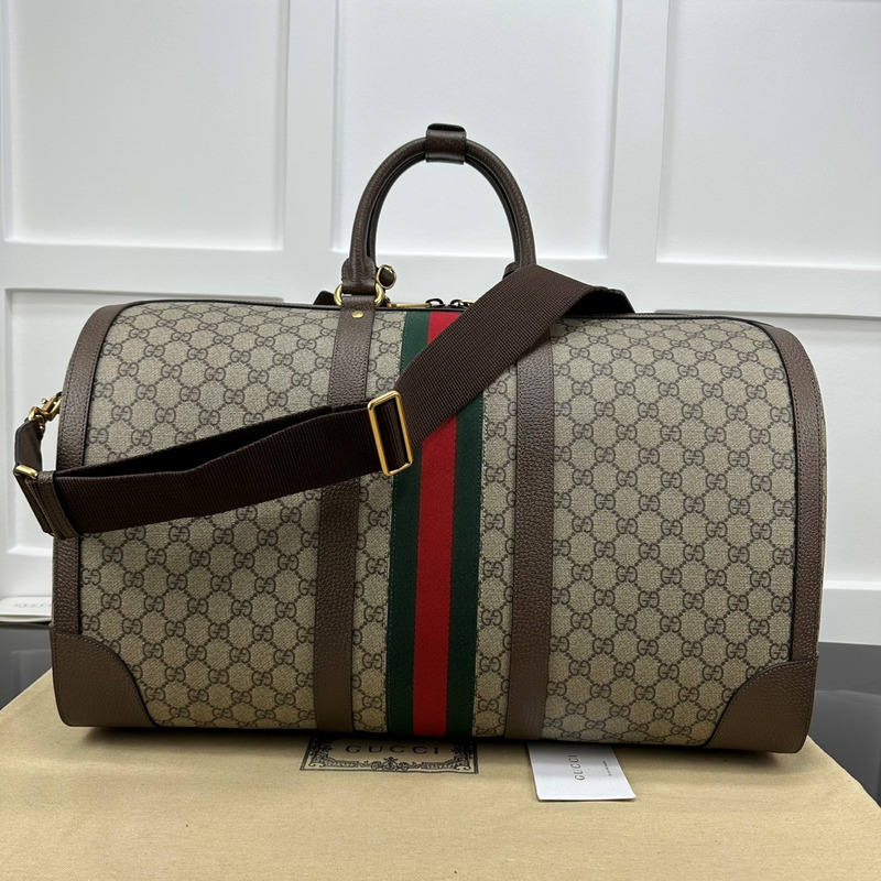 G*u*i savoy series small travel bag