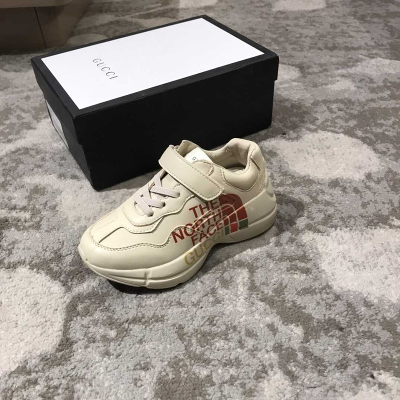 g*u*i x the n0*h F**e kids sneakers