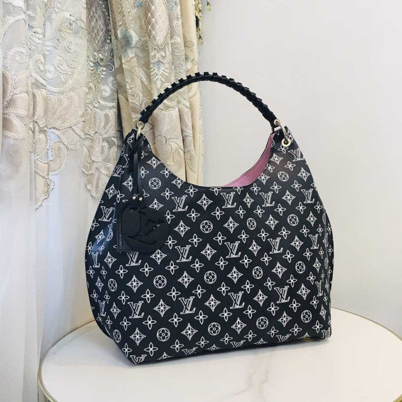l**is V*t*n m21299 carmel mahina leather bag