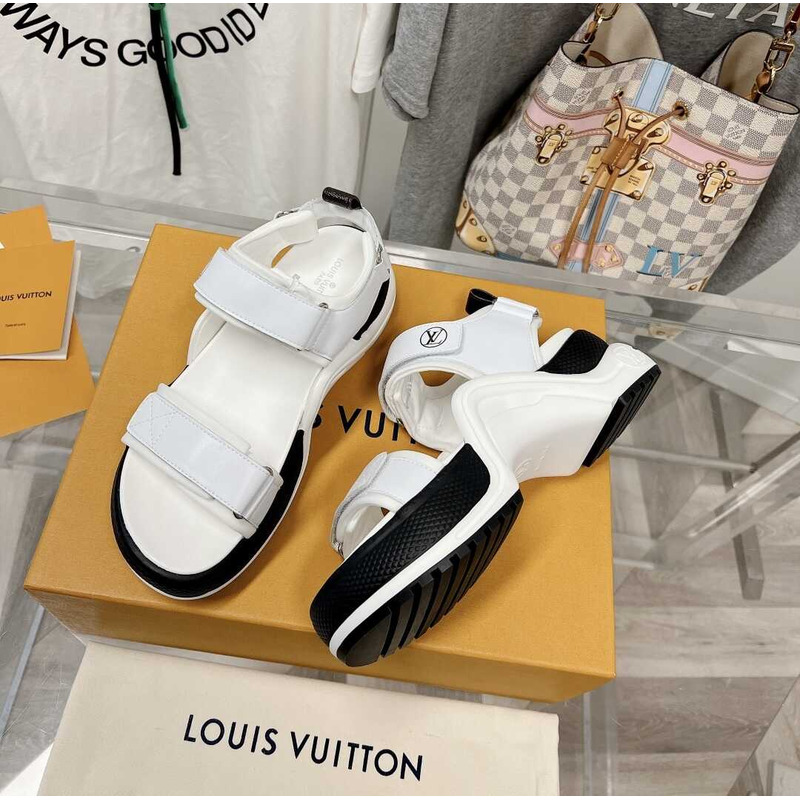 l**is V*t*n archlight sandal black and white