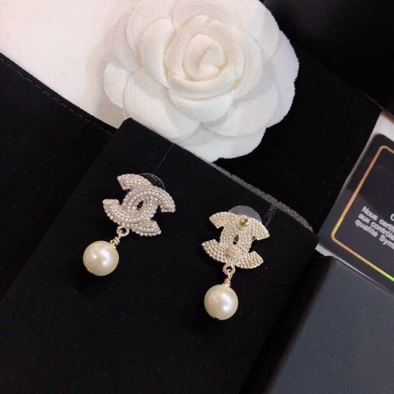 Ch*el crystal and pearl cc earrings