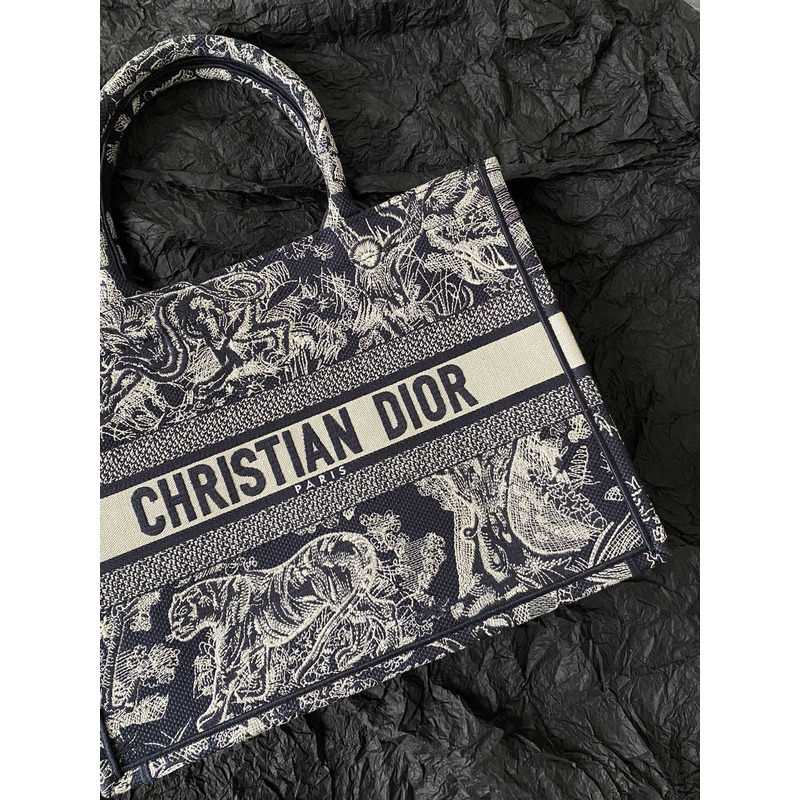 D*or medium book tote ecru toile de jouy reverse embroidery blue