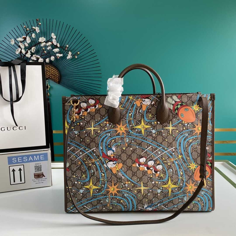 G*u*i x disney limited tote beige