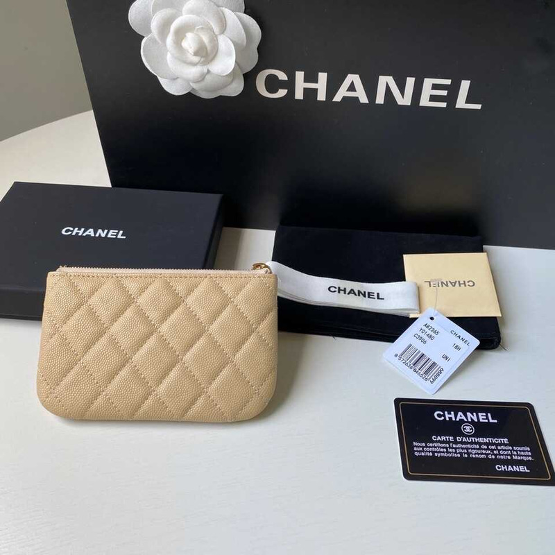 Ch*el Ch*el caviar quilted zipped key holder case beige