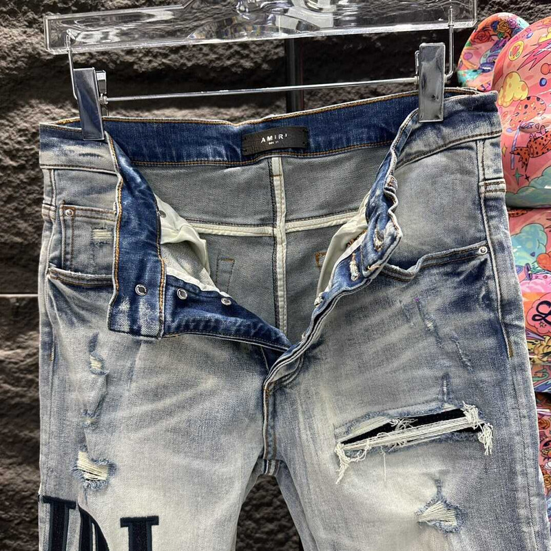 Amiri Logo Distressed Skinny Jeans Blue