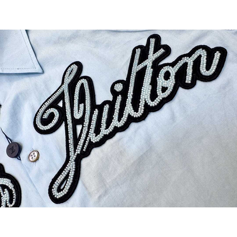 l**is V*t*n embroidered cotton shirt sky blue