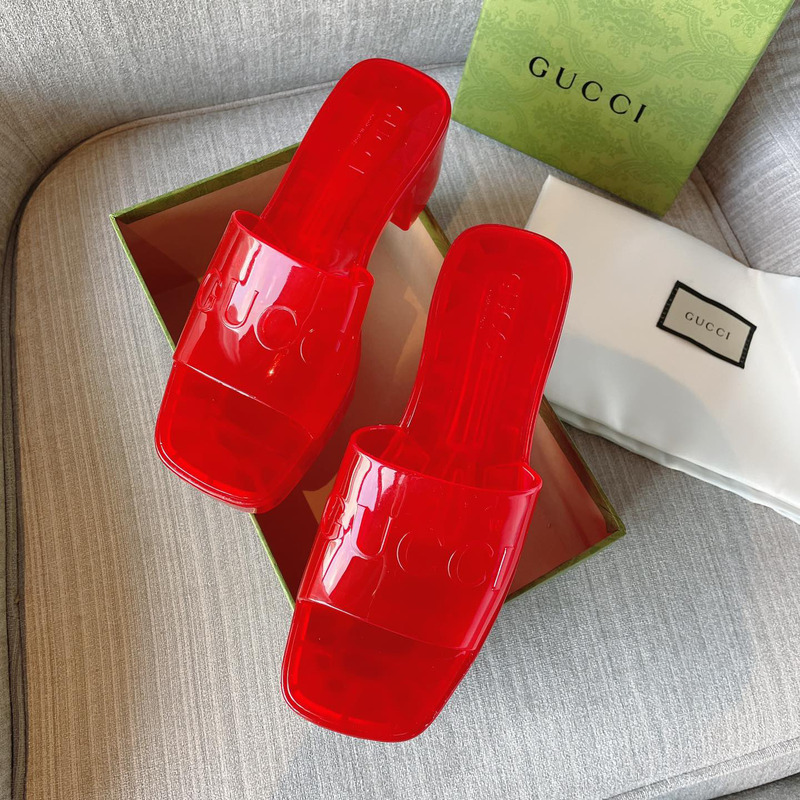 G*u*i plastique logo-embossed rubber mules