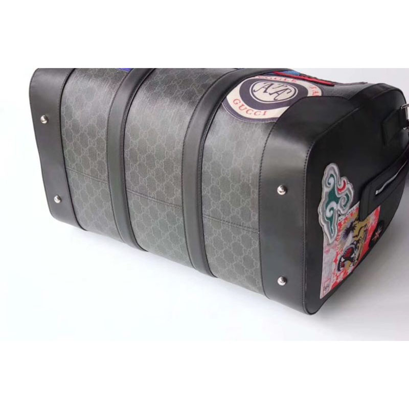 courrier G*u*i suitcase